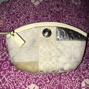 Coach cosmetics case.